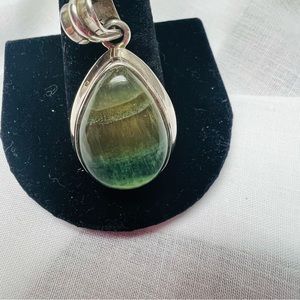 Sterling Silver oval Pendent - I am not sure what this natural stone is.